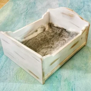 سرير خشبي لتصوير المواليد