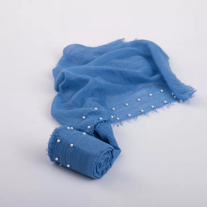 لفة قماش قطن باطراف من اللولو لتصوير المواليد