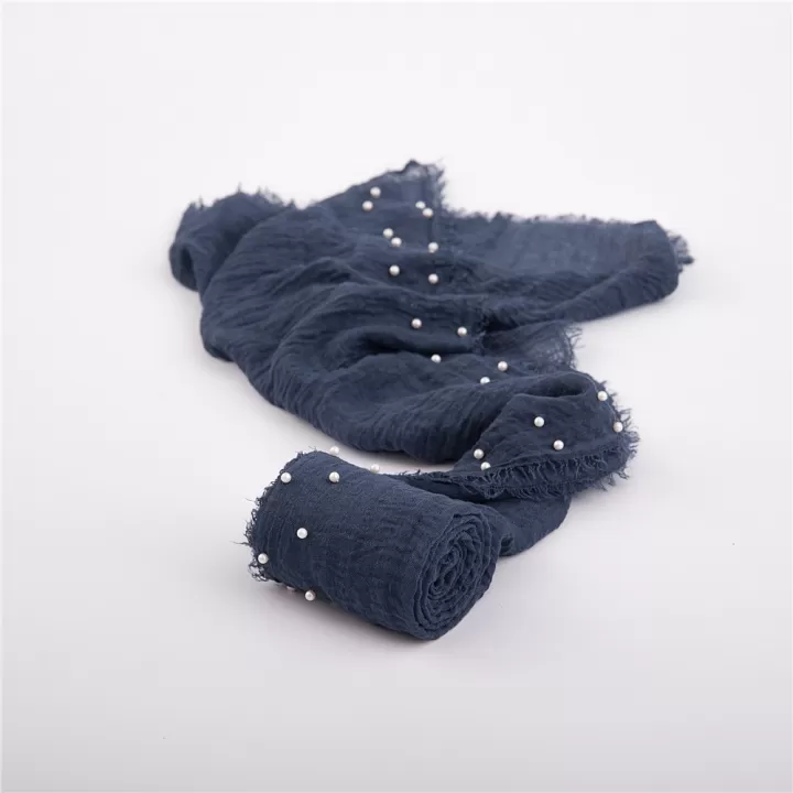 لفة قماش قطن باطراف من اللولو لتصوير المواليد