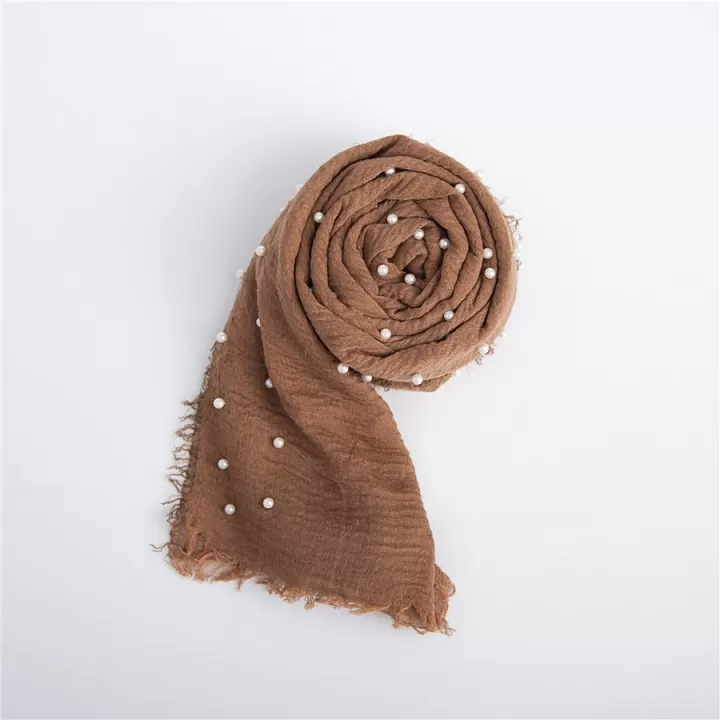 لفة قماش قطن باطراف من اللولو لتصوير المواليد