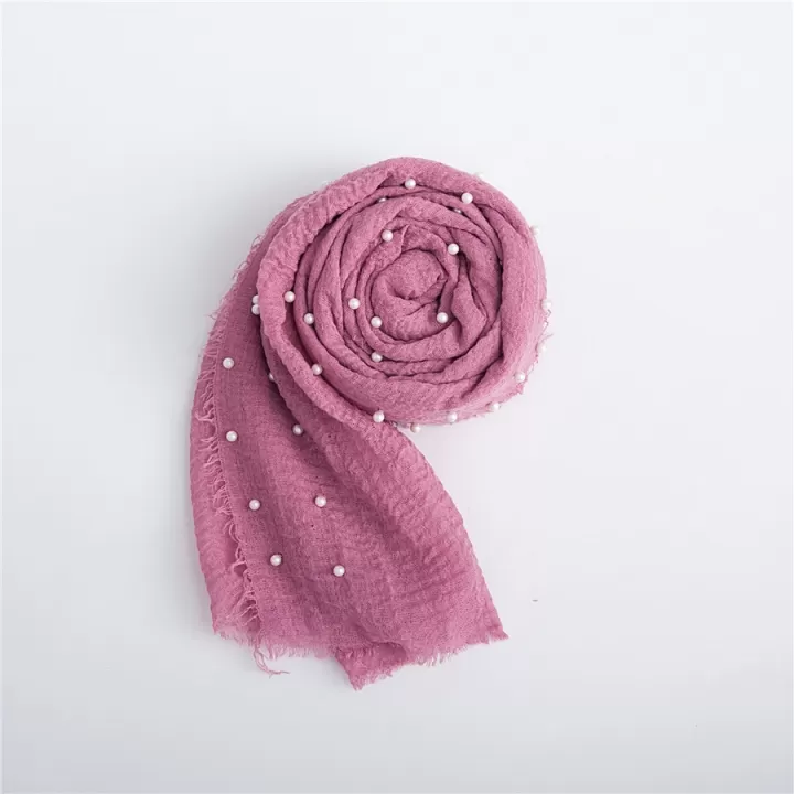 لفة قماش قطن باطراف من اللولو لتصوير المواليد